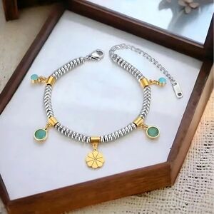Chic Gold and Silver Bracelet with Green Accents